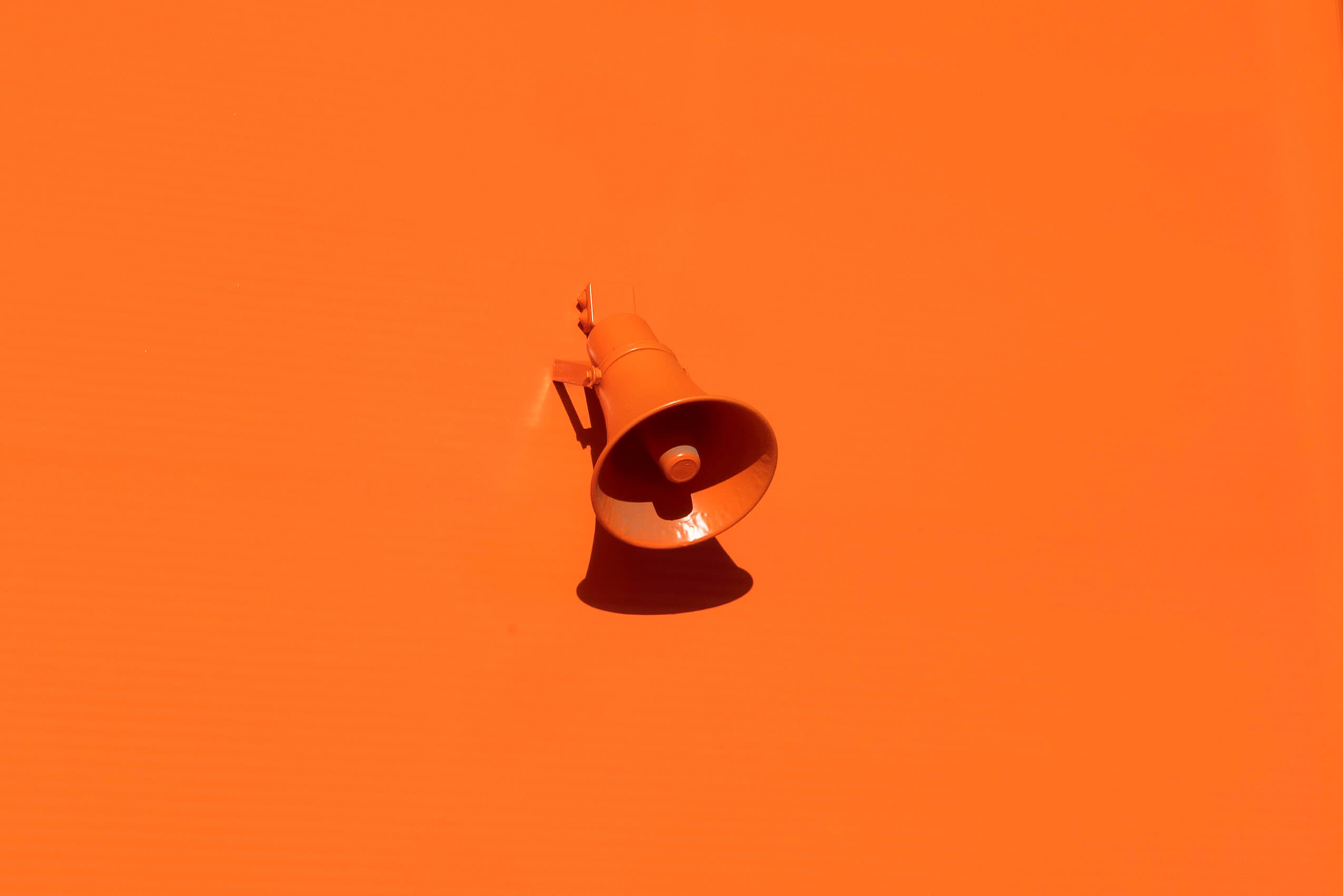 Speaker phone. Be a voice not an echo.