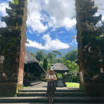 Girl Phi Dang standing in front of Batu Karu temple